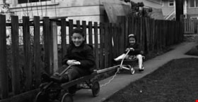 Sean and Wendy with wagons, 1964 thumbnail