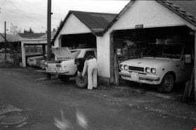Frances and Wendy Changing Tire, 1977 thumbnail