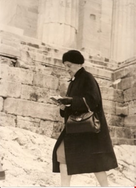 Mary Buxton walking up the steps of the Coliseum, [1970] thumbnail