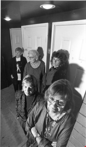 Eileen Kernaghan standing in front of four poets at the Poetry Pocket Cafe in New Westminster, October 15, 1995. Item no. 535-0014 thumbnail