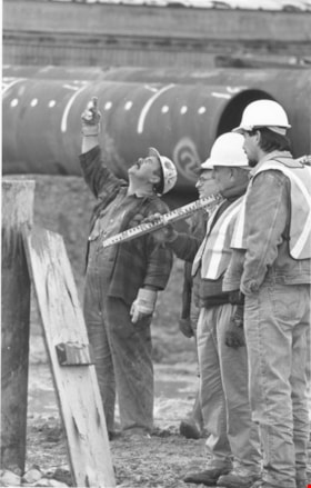 Unidentified men working on a construction site, November, 1995 thumbnail