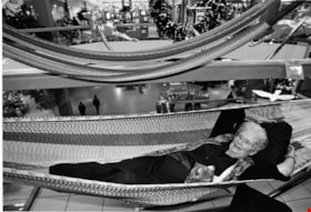Woman sitting in a hammock, December 17, 1995 thumbnail