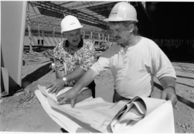 Gerry Dean with a worker, December 27, 1995 thumbnail