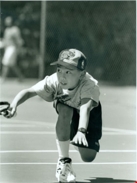 Boy playing tennis, June 2, 1996 thumbnail