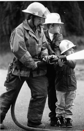 Boys dressed as firefighters, October 23, 1996 thumbnail