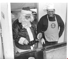Santa flipping pancakes, December 18, 1996 thumbnail