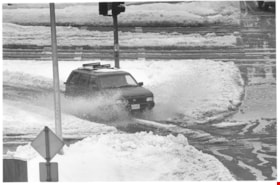 Car driving through snow, December 31, 1996 thumbnail