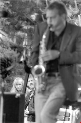 Man playing the saxophone, June 29, 1997 thumbnail