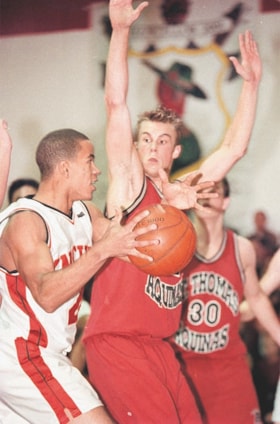 St. Thomas More Collegiate basketball game, [2001] thumbnail