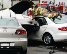 Fire fighters at a car accident, [2006] thumbnail