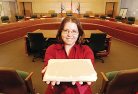 Archivist Arilea Sill with council minutes, [2005] thumbnail