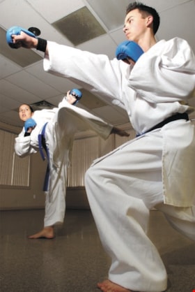 Matt Bickel and Andrea Maikawa practicing karate, [2004] thumbnail