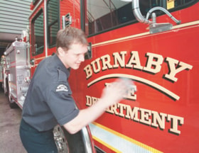 Kevin Stapelmann with new Burnaby fire truck, [2000] thumbnail