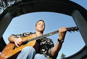 Jeff Standfield playing guitar, [2002] thumbnail