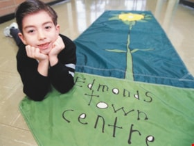 Student with Edmonds Town Centre banner, [2002] thumbnail