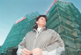 Person in front of leaky condos, [1999] thumbnail
