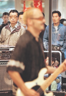 Band playing in a mall, [1999] thumbnail