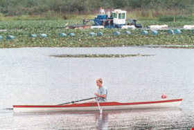 Rower and dredger on Burnaby Lake, [1999] thumbnail
