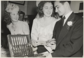 Lillian and John open their gifts, October 16, 1948 thumbnail