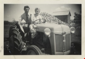 Lillian and John on a Fordson tractor, 1949 thumbnail