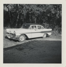 John Yanko in the driver's seat, July 1957 thumbnail