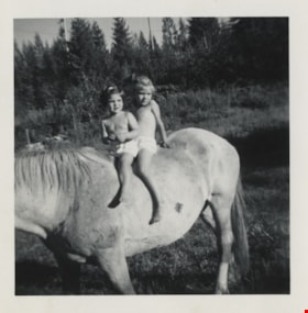 Sherrie and Rhonda on horseback, July 1957 thumbnail