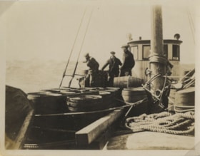 Unidentified men on a boat, [between 1918 and 1925] thumbnail