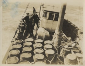 Three men on a boat, [between 1918 and 1925] thumbnail