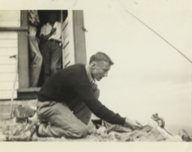 Cleve Cunningham feeding a chipmunk, [193-] thumbnail