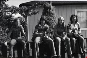 Teenagers sitting on a fence, September 16, 1976 thumbnail
