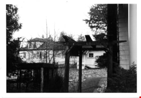 Corner of Elworth house with yard and pergola, [1970] thumbnail