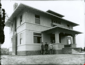 Three men in front of newly constructed house, [190-] thumbnail