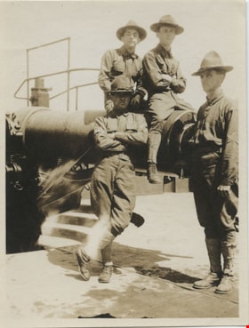 Soldiers sitting on a gun barrel, [between 1914 and 1918] thumbnail