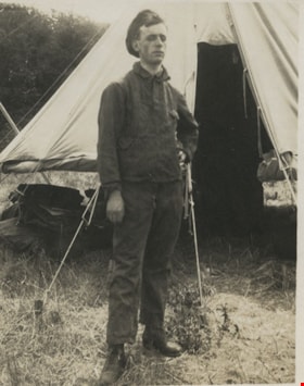 Soldier standing in front of tent, [between 1914 and 1918] thumbnail