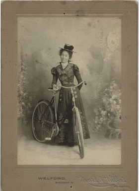 Woman with a bicycle, [190-] thumbnail