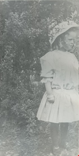 Girl in a garden, [190-?] (date of original), copied 1977 thumbnail
