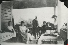 Having tea on the porch, [190-] (date of original), copied 1977 thumbnail