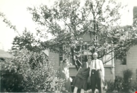 Mr. and Mrs. Orville E. Butler with his daughter, [ca. 1930] thumbnail