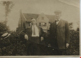 Two men by a hedge, [190-] thumbnail