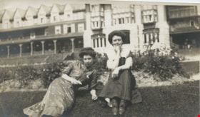 Seated on a lawn, [190-] thumbnail