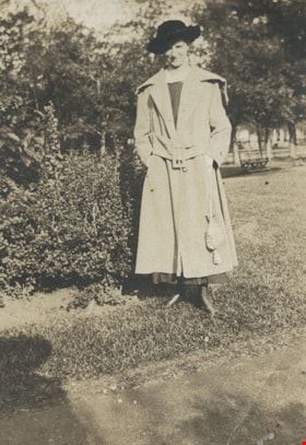 Woman in a trench coat, [191-?] thumbnail