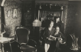 Couple in living room, [between 1930 and 1949] thumbnail