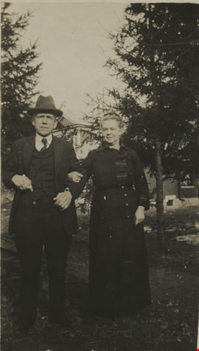 Couple standing in a field, March 26, 1922 thumbnail