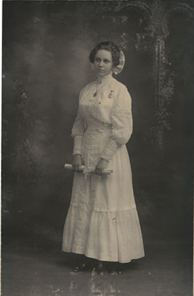 Young woman with diploma, [189-] thumbnail