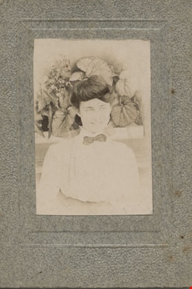 Woman with plant, [ca. 1910] thumbnail