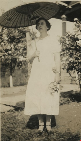 Woman with a parasol, [between 1912 and 1925] thumbnail