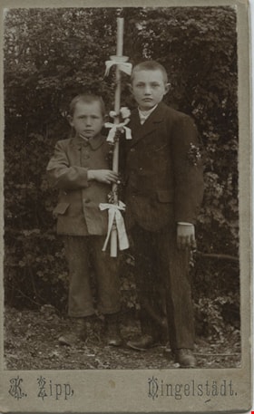 Two boys with a decorated candle, [190-] thumbnail