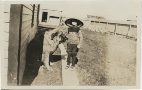 Boy and a large dog, [1915] thumbnail