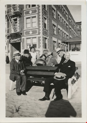 People on benches in front of  thumbnail