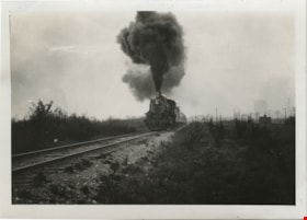 Train blowing out smoke, [between 1930 and 1949] thumbnail